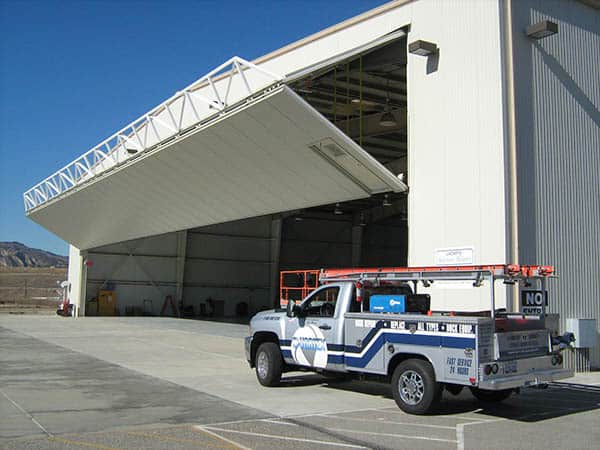 https://www.vortexdoors.com/wp-content/uploads/2023/08/LADWP-Hangar.jpg